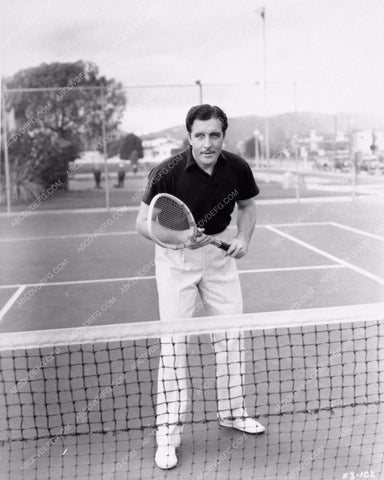 candid photo of John Boles on the tennis court 1324-14