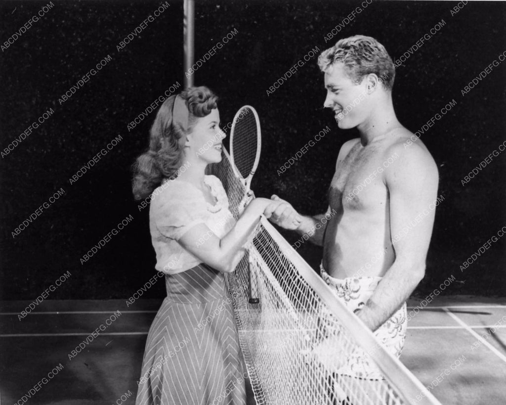 candid Shirley Temple and handsome shirtless Guy Madison playing tenni –  ABCDVDVIDEO