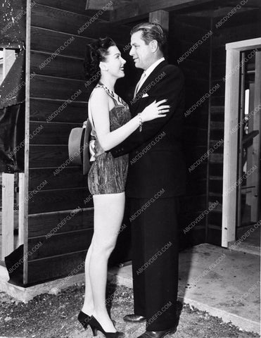 Ann Miller in leggy swimsuit w Richard Rober Watch the Birdie 1358-34