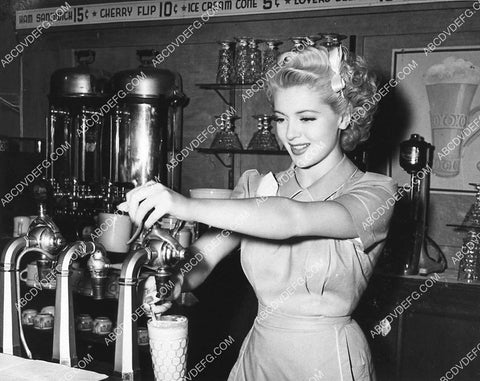 candid Lana Turner making a chocolate shake at the diner counter 1506-18