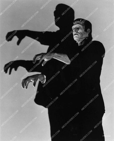 Bela Lugosi at home w one of his awards 1594-34