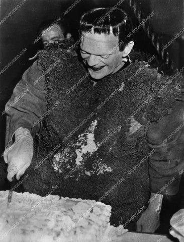 Boris Karloff cutting birthday cake on set film The Son of Frankenstein 1624-30