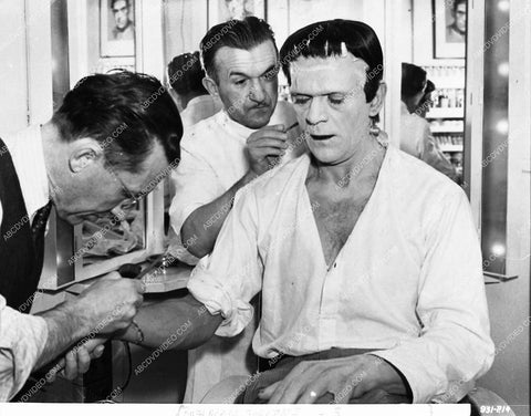 Bela Lugosi helps crew get Boris Karloff ready for shot film Son of Frankenstein 1630-15