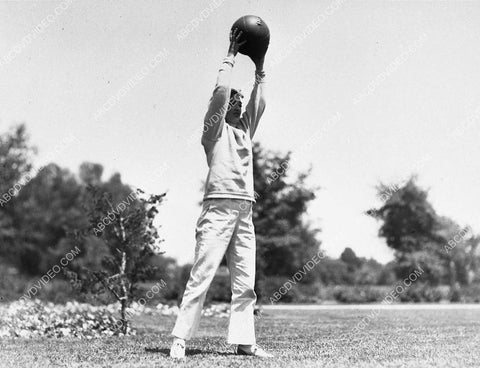 candid Marion Davies does some exercises with the ball outdoors 1660-01