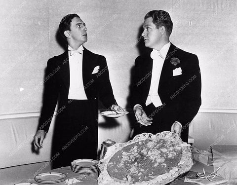 candid Ray Bolger Nelson Eddy after the cake is gone behind the scenes 1674-29