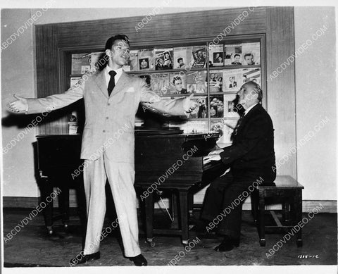 Frank Sinatra at WCBS microphone w little puppet or doll 1728-29