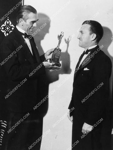 Boris Karloff gives Jack Pierce an award 1848-25