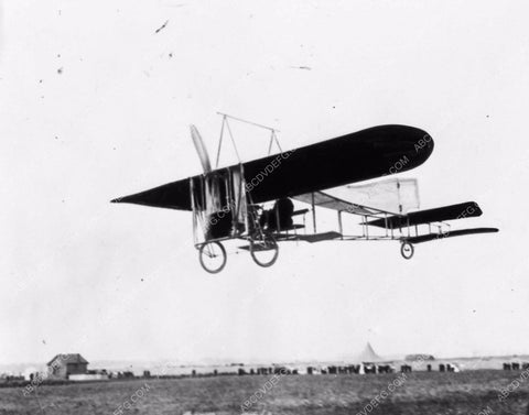 Louis Bleriot pilots this plane to cross the English Channel 1868-20