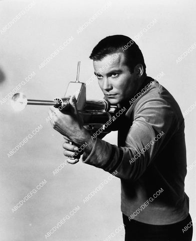 William Shatner posing w rifle phaser TV Star Trek 1905-11