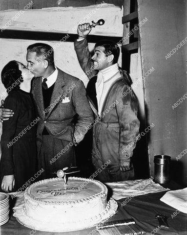 Myrna Loy Victor Fleming Clark Gable cut birthday cake on set film Test Pilot 1909-08