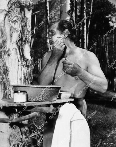 Clark Gable shaving in the outdoors 1909-21