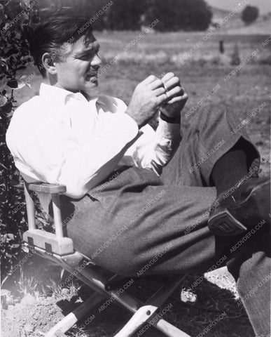 candid photo Clark Gable taking it easy between takes 1910-06