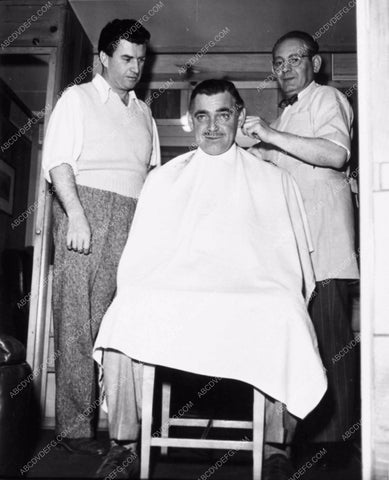 great candid Clark Gable in makeup department chair getting prepped 1910-09