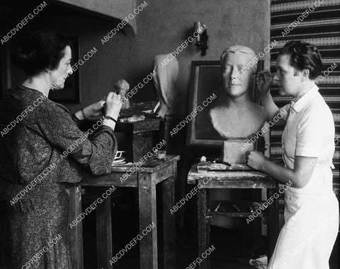 unknown female sculptor making a bust 1913-28