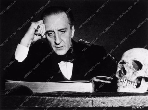 Basil Rathbone and a skull in The Black Sleep 1933-31