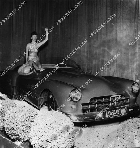 waving model from new custom 1951 Cadillac automobile on a float I think 1940-21