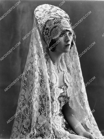 Bess Flowers in bridal gown portrait 1956-10