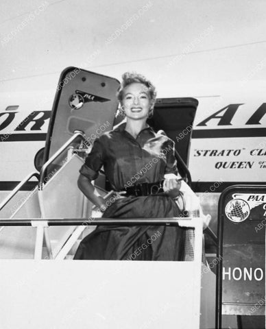 candid Evelyn Keyes getting on Pan American Airlines 1996-09