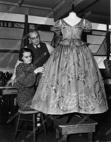 wardrobe costume department assistants work on Adrian gown for MGM film The Firefly 2001-10