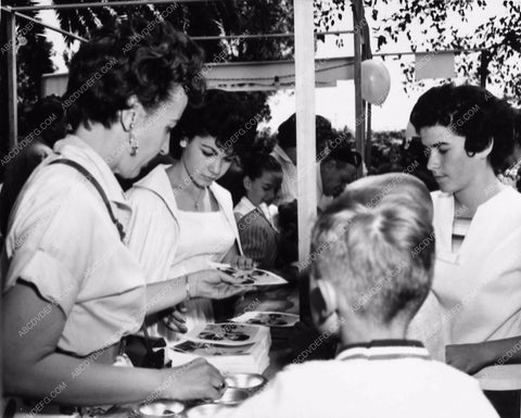 candid Annette Funicello at a function signing autographs for fans 2010-26