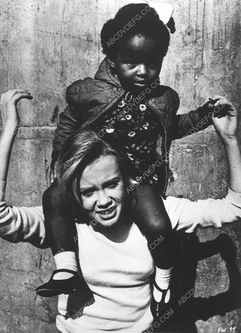 candid Hayley Mills playing w little girl on set The Family Way 2106-07