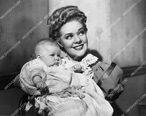 Alice Faye holding a baby film Little Old New York 2122-05