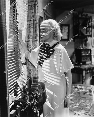 Alice Faye looking through the blinds film She Learned About Sailors 2122-11