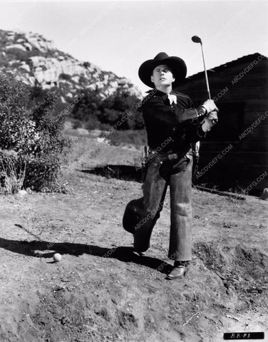 cowboy western film star Bob Baker playing golf behind the scenes 2126-15