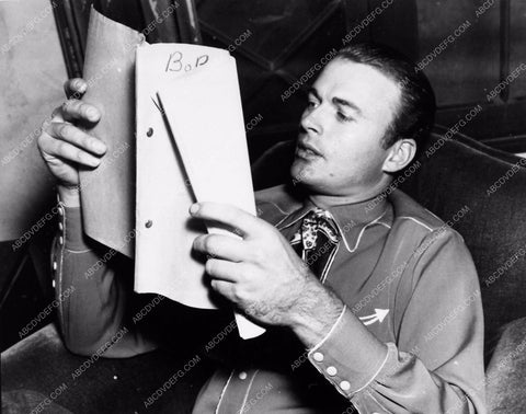 candid Bob Baker behind the scenes reading his script 2126-16