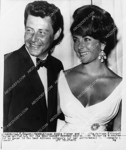 news photo Eddie Fisher Elizabeth Taylor arrive at the Academy Awards 2136-29