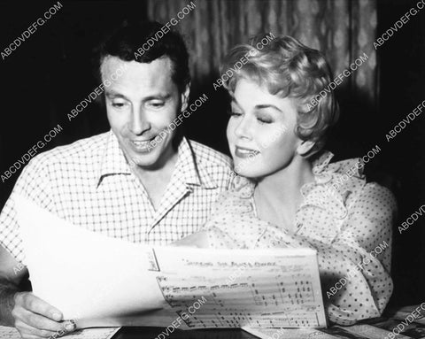 candid Doris Day going over some music 2159-33