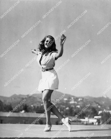 Rita Hayworth dancing in the sunshine 2162-20