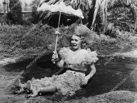 Alice Faye takes a spill in the mud film Hollywood Cavalcade 2162-34