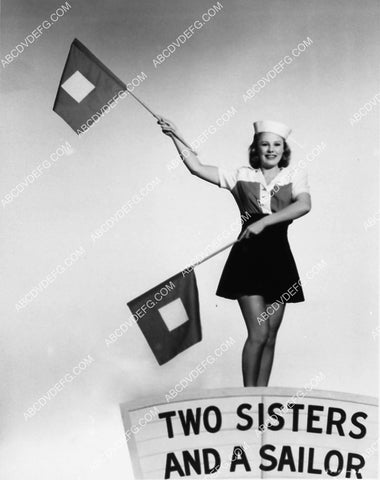 June Allyson waving the semaphore flags film Two Girls and a Sailor 2223-14