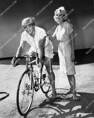 Mike Hiltner Yvette Mimieux test the bicycle on set film The Time Machine 2308-17