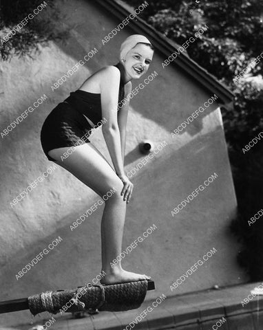 Judy Garland in the backyard on the diving board 2350-08
