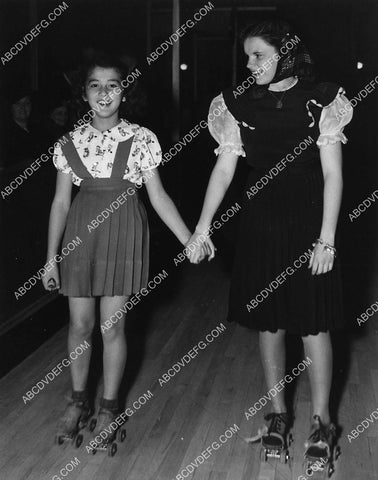 Judy Garland and friend go roller skating at Hollywood Rollerdome 2350-18