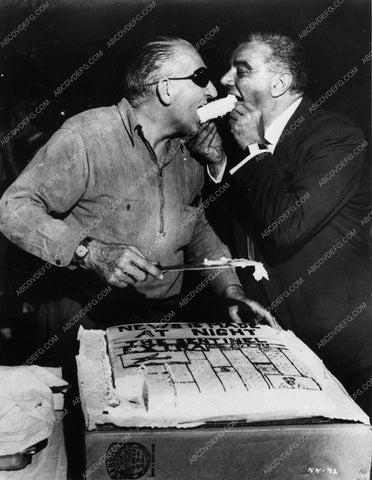 candid director Fritz Lang cutting and sharing the birthday cake 2418-35