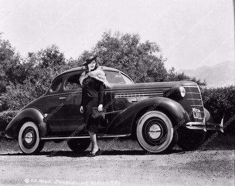Jacqueline Wells and her new 1938 Chevrolet automobile 2539-14