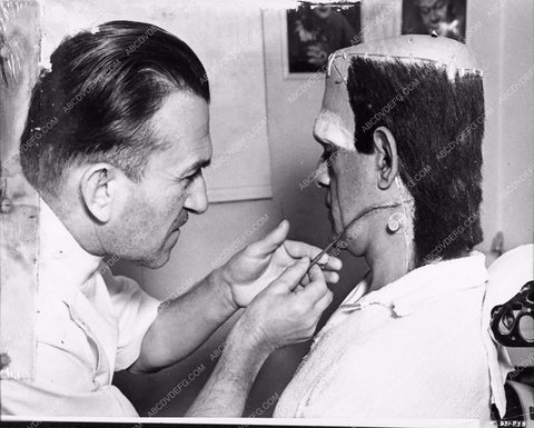 Jack Pierce applying Boris Karloff's Frankenstein makeup behind the sc 2706-34