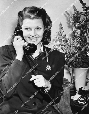 Rita Hayworth takes a telephone call 2714-14