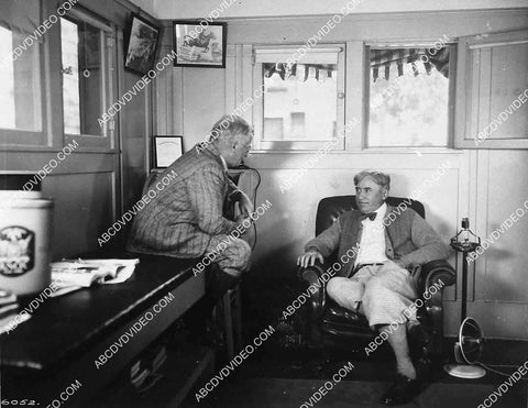 2878-024 movie mogul Mack Sennett w someone in his office 2878-024