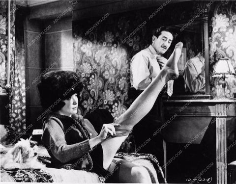 Shirley MacLaine putting on her stockings film Irma La Douce 2909b-18