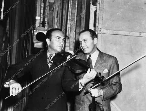 candid Jack Benny and fellow violin enthusiast 2988-01