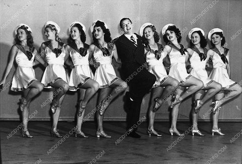 Milton Berle on stage w bunch of chorus girls 2988-03