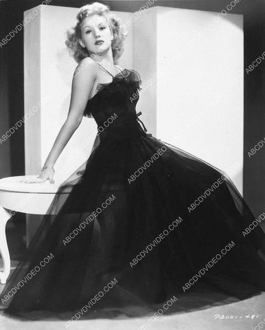 Betty Grable models her new black dress 3030-25