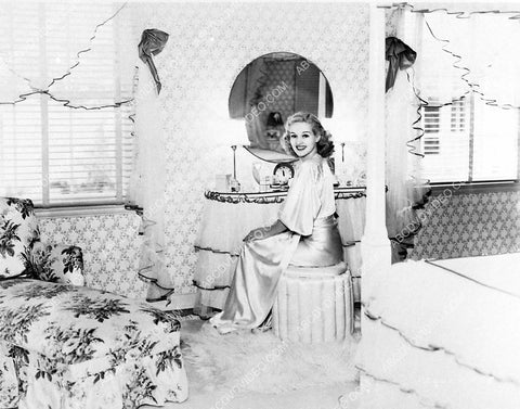 Betty Grable at her makeup table at home 3030-26