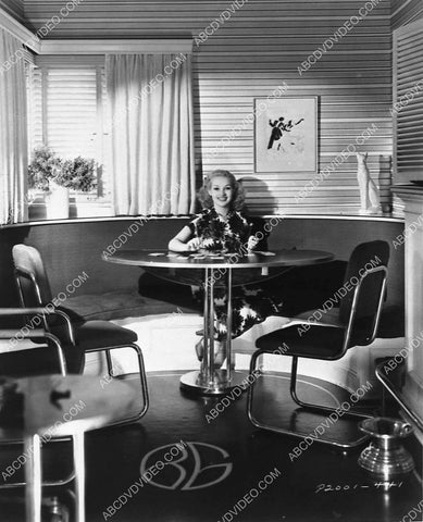 Betty Grable playing solitare in her swank bar room 3031-29