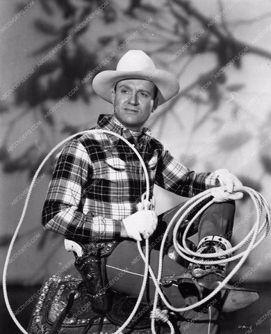 Gene Autry seated western portrait with lasso 3068-30