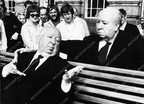 Alfred Hitchcock talking to wax figure of self 3076-23